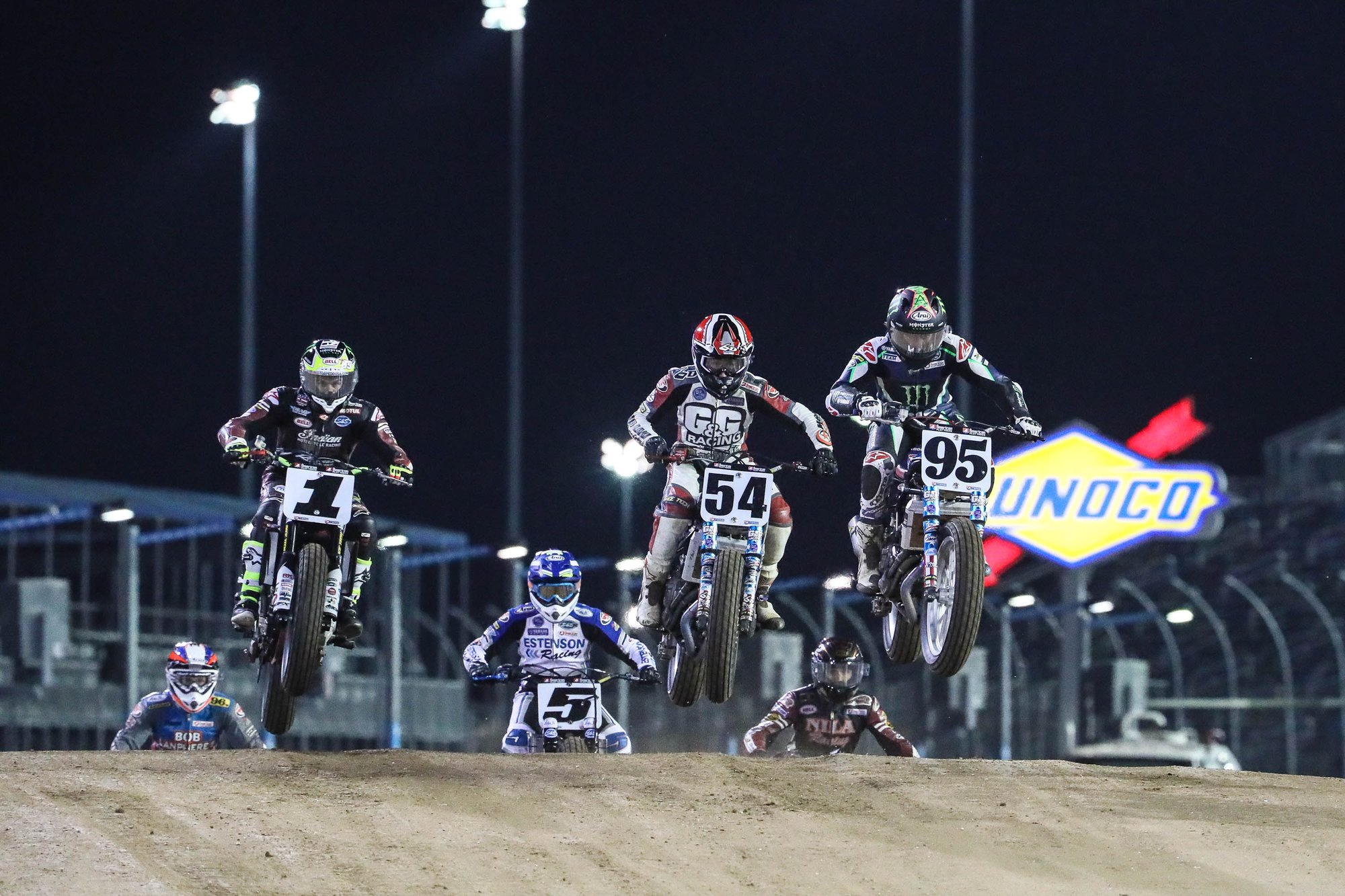 Motocross Race with Sunoco Signage in Background