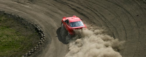 Race Car on Dirt Track